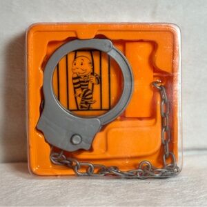 Monopoly Cheaters Edition  Handcuff Replacement Part....New